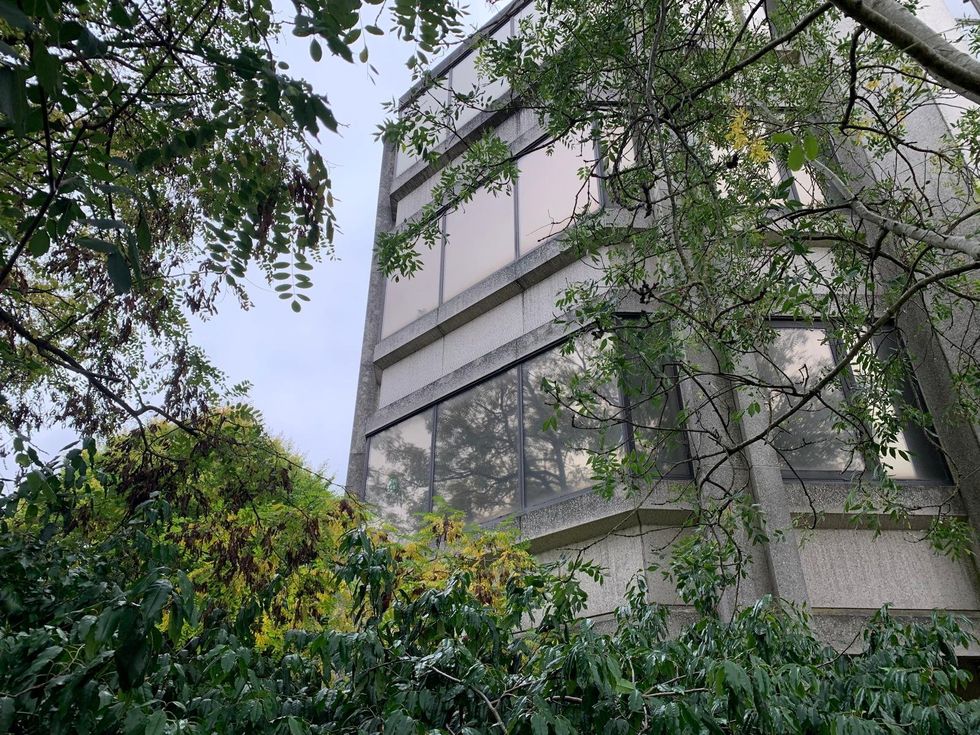 \u200bWindows of the building appear smashed in, with damage to various parts of the former office block