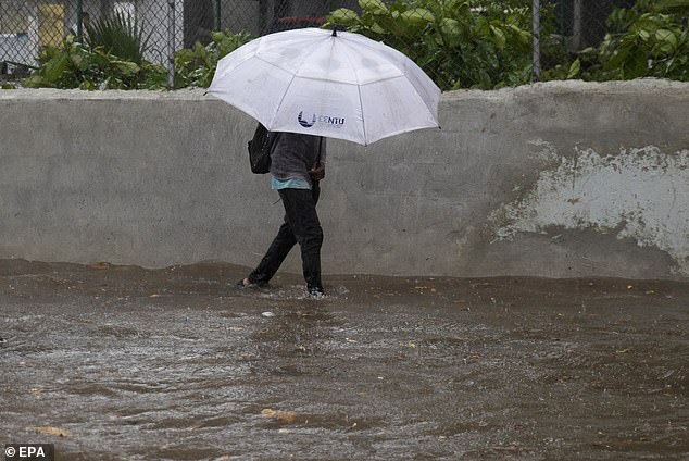 A hurricane watch was in effect for southern Haiti from the border it shares with the Dominican Republic (pictured) to Port-au-Prince, while Jamaica was under a tropical storm watch