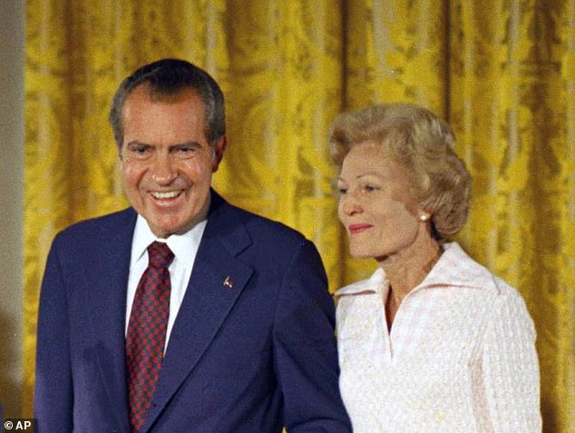 Former staffers of Republican First Lady Pat Nixon (right), photographed with former President Richard Nixon (left) in 1974 wrote to the National Capital Planning Commission trying to halt 'this horrible project' that has left their former offices demolished