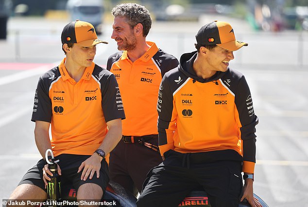 Piastri (left) is pictured with team principal Andrea Stella (centre) and Norris at the Italian Grand Prix in September