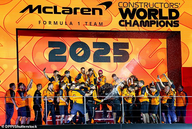 What's wrong with this picture? The McLaren team celebrate winning the constructors' championship in Singapore... without Piastri