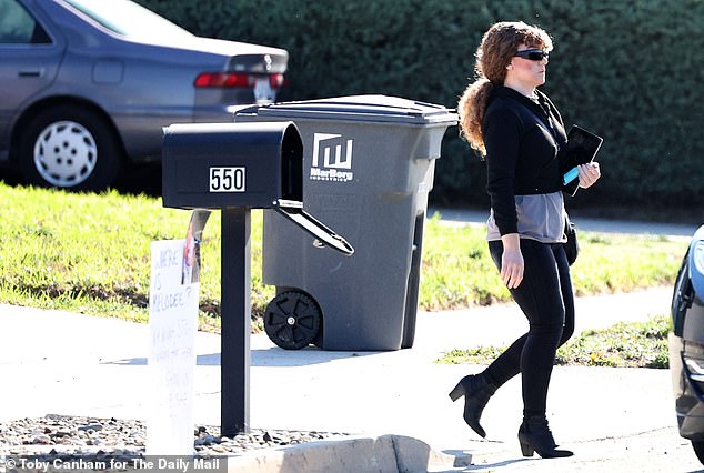 Walking down the driveway and past her daughter's missing sign, Ashlee got into her friends black Lincoln sedan early on Wednesday morning and was driven to a Budget and then an airport Avis location