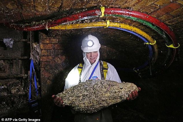 In severe cases, fats from milk and other sources come together to form fatbergs. These huge collections of oils, plastic, and waste can grow to be over 100 tonnes. Pictured: Technicians remove a fatberg beneath Regent Street, London