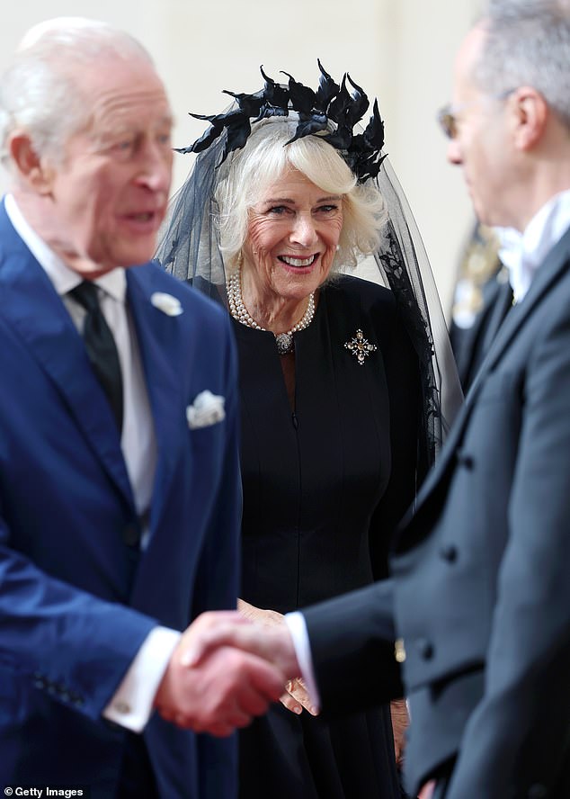 King Charles III and Queen Camilla are welcomed by officials at San Damaso Courtyard today