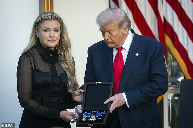 Donald Trump and Erika Kirk during a ceremony to posthumously award Charlie Kirk the Presidential Medal of Freedom at the White House on October 14