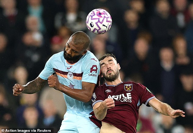Andy Irving (right) played in midfield for West Ham against Brentford in his first home league start, 780 days after joining the club