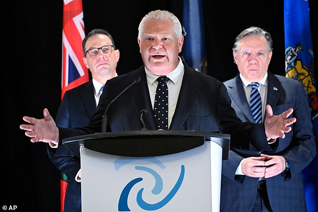 The spot was part of a $75million CAN campaign to push back against the strategy by the province of Ontario - Canada's largest province - which is run by Premier Doug Ford (pictured center), a conservative who has slammed Trump in the past