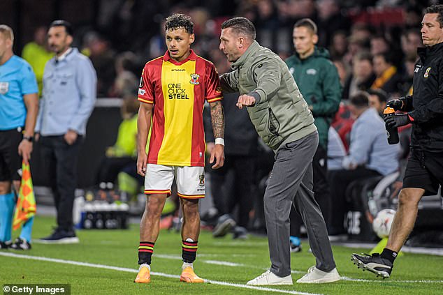 Go Ahead Eagles coach Melvin Boel, who used to work with Slot, gives instructions to his player Dean James