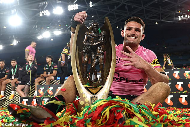 Cleary poses with the Provan-Summons trophy after beating Melbourne Storm in the 2024 Grand Final