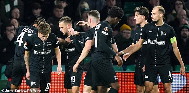 Sturm Graz's Tomi Horvat (third left) celebrates after scoring his side's opening goal
