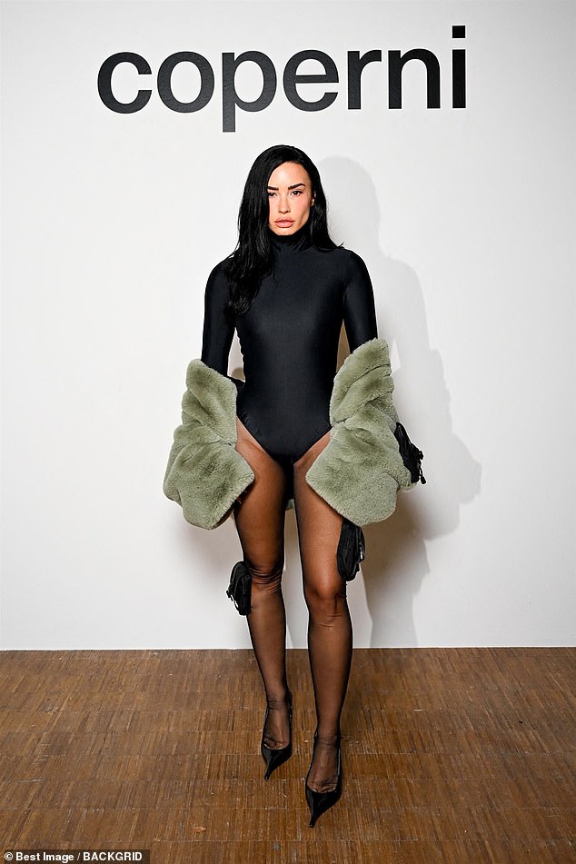 Demi Lovato showed off her incredibly taut face as she attended the Coperni womenswear show as part of Paris Fashion Week on Monday