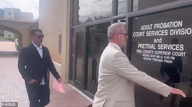 Scholtes (left) refused to say a word as he arrived at Pima County court on Wednesday, as he was asked whether he had anything to say and if he apologized to Parker's grandparents