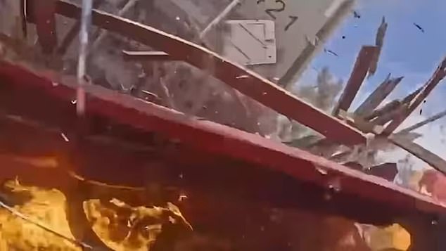 One of the cars burst into a fireball following the impact, which sent debris flying