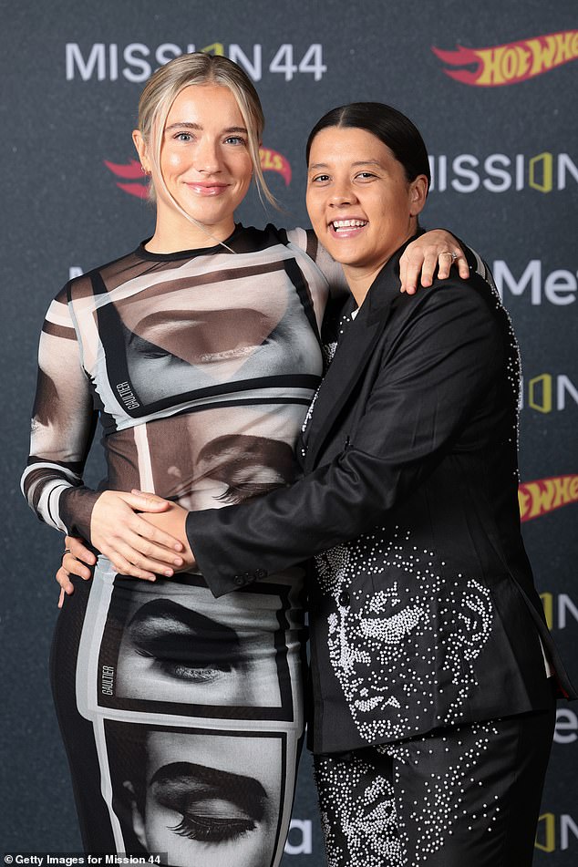 Sam Kerr is set to make her return to international football for the Matildas this week after nearly 23 months away (Picture: Kerr, right, with her partner Kristie Mewis)