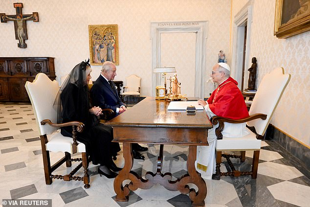Pope Leo XIV sits with King Charles III and Queen Camilla during a private audience today