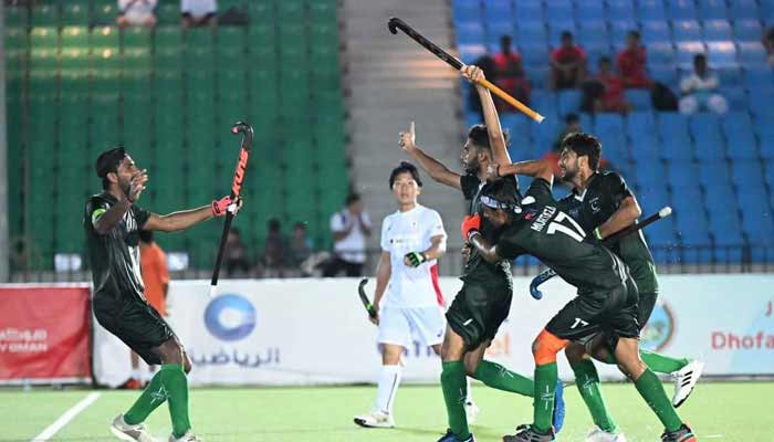 Pakistani players celebrate after scoring a goal against Japan in this undated image. — Geo.tv/File