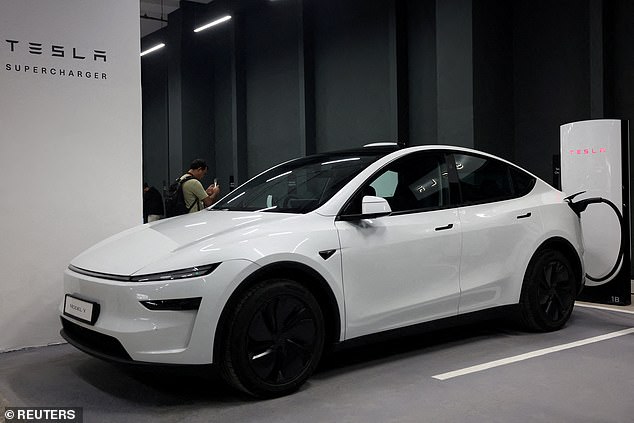 Quarterly results: Tesla said third-quarter earnings fell 37% to $1.4bn