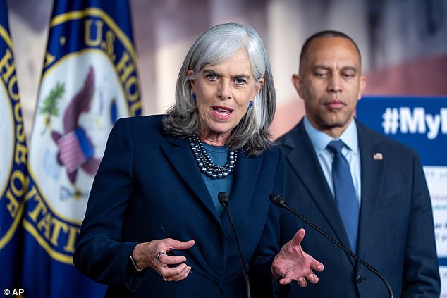 Rep. Katherine Clark, D-Mass., the House minority whip, is joined at right by House Minority Leader Hakeem Jeffries, D-N.Y., during a news conference on day 22 of the government shutdown to discuss the how the crisis can impact health care, at the Capitol in Washington, Wednesday, Oct. 22, 2025.