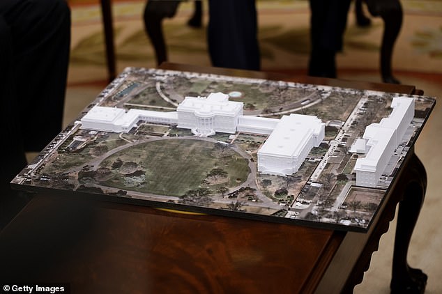 A model of what the White House complex will look like after President Donald Trump's ballroom is added on top of what was the East Wing