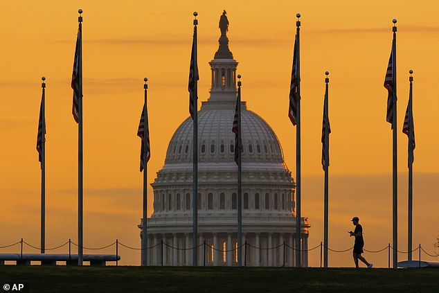 The US national debt has surpassed $38 trillion for the first time in history (Pictured: The US Capitol Building in Washington DC)