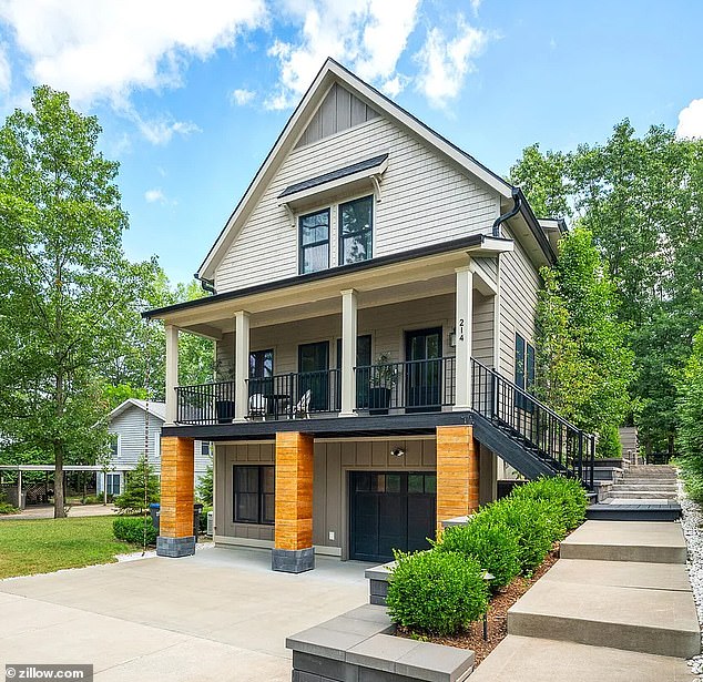 Tracey owned the stunning four-bedroom home in New Buffalo, Michigan, seen here, where her husband brutally attacked