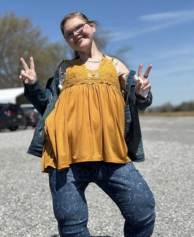 In another photo from the new TikTok, Tammy flashed peace signs in a form-fitting ensemble