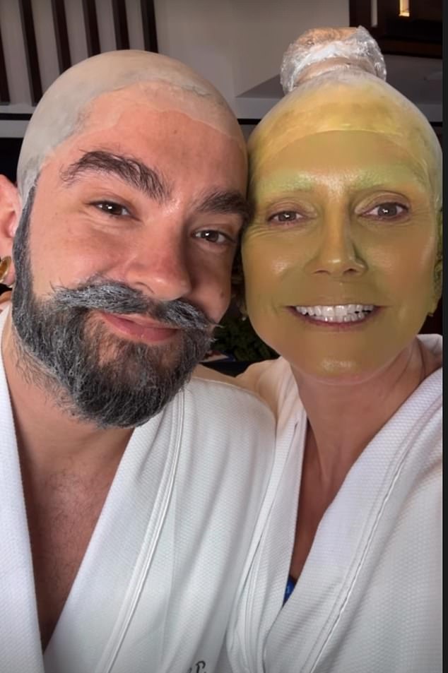 Her husband is also dressing up with his wife