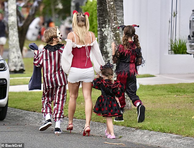 The family could be seen going from door-to-door trick or treating, taking pictures of their Halloween costumes and enjoying soft serve ice cream cones