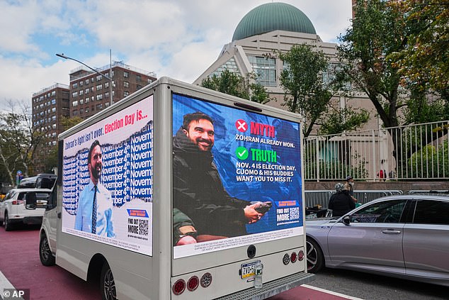 New York very nearly went bankrupt in 1975. Experts have warned it could easily happen again ¿ and that was even before the city that never sleeps faced the daunting prospect of having Mamdani at the helm. Pictured: A video advertising truck for the candidate near the city's Isalmic Cultural Centre on Friday