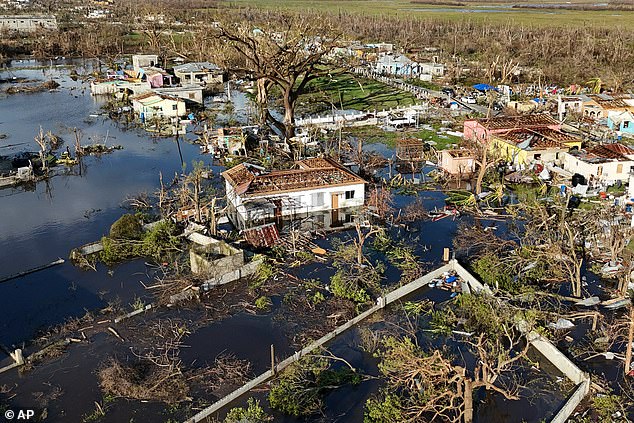 Hurricane Melissa was named a Category 5 hurricane, one of the strongest to ever hit the region (Pictured: An aerial view of Black River, Jamaica after the storm)