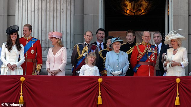William and Kate appear at the opposite end of the Buckingham Palace balcony to Andrew in 2011