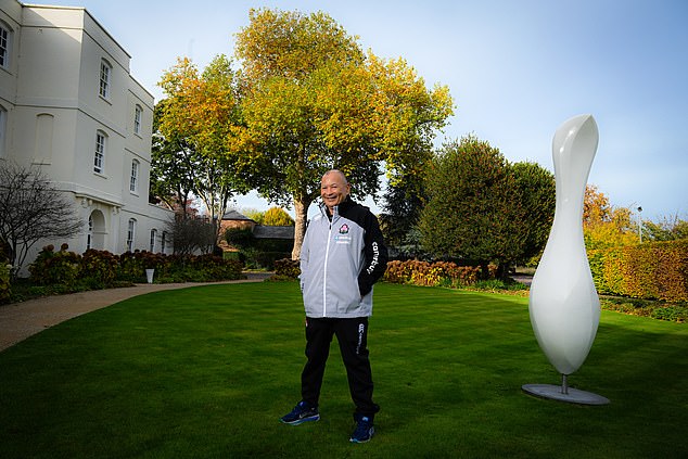 Jones steps out into the garden for a quick photoshoot - before dashing off to his office to plot his next move
