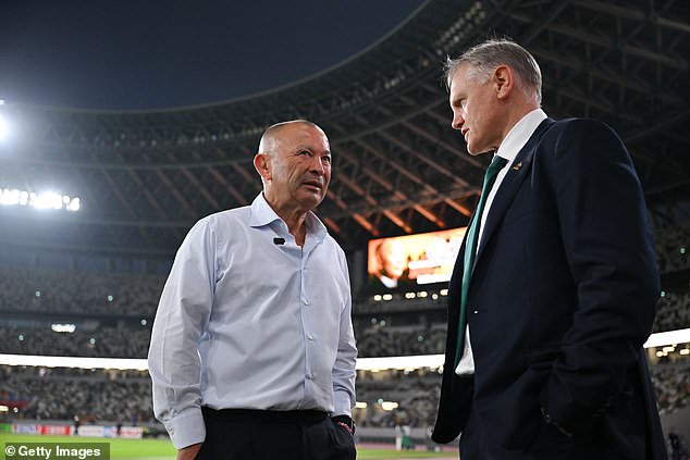 Jones chats with Australia coach Joe Schmidt after his Japan side's 19-15 loss to the Wallabies last weekend