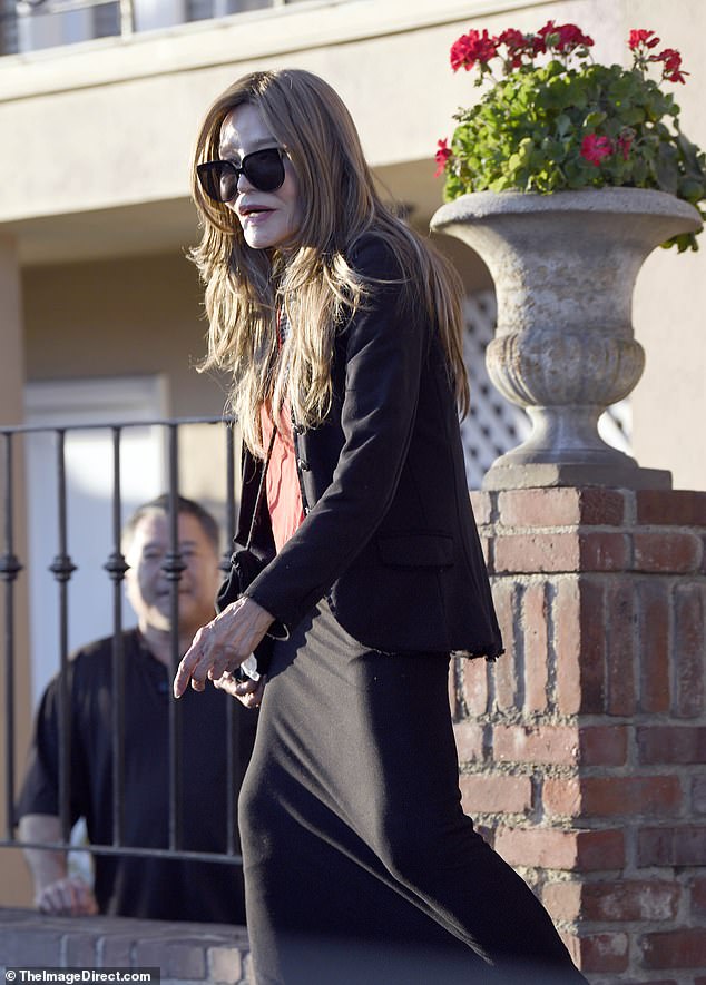 Dressed in a red sweater, black jacket, and long skirt, the Nicaraguan-born American actress and model looked worlds away from the skimpy outfits she wore as the scheming Angelica Nero on the iconic soap Dallas