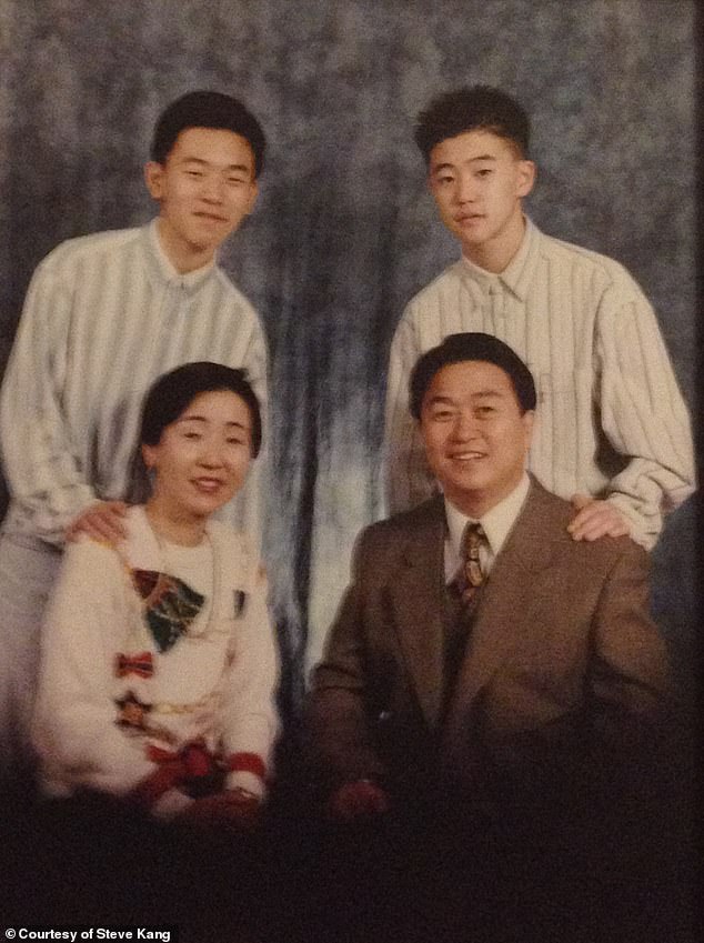 Kang (top right) with his family - his father was plunged into poverty following the financial crisis in South Korea in 1998