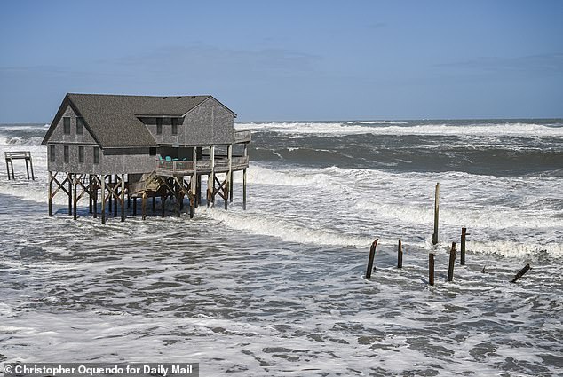 One of the last remaining homes on a stretch of beach in Buxton, NC, where 15 houses have fell into the sea in just a few weeks