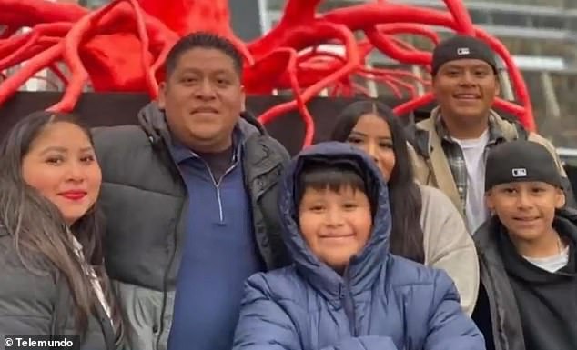 Juarez's eldest son, 20, serves in the US Marine Corps. Their younger children, ages 10, 12, and 16, were born in America. He is seen here along with his wife