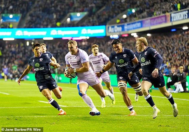 Scotland's Duhan van der Merwe scores his side's second try of the game