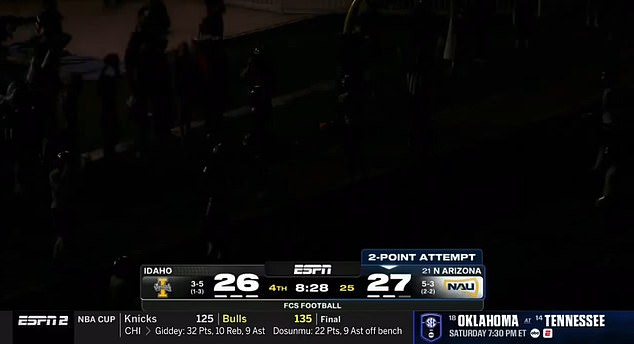 The stadium was plunged into darkness as the ball left quarterback Ty Pennington's hands