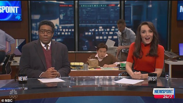 The next sketch featured a newsroom with a number of unruly workers in the background who continued to interrupt the live show