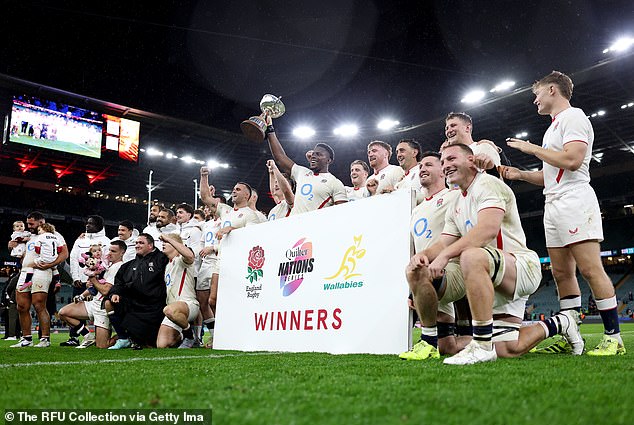 Captain Maro Itoje holds the Ella-Mobbs trophy aloft after today's victory over Australia