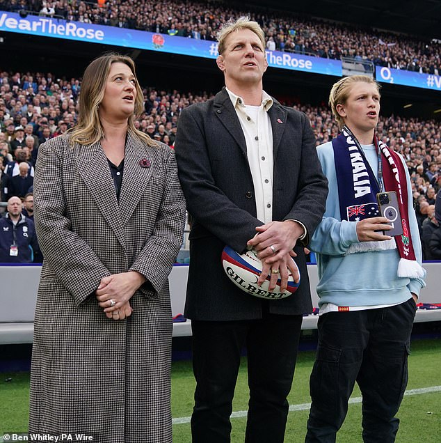 The former World Cup winner then stood pitchside with his family to sign the national anthem