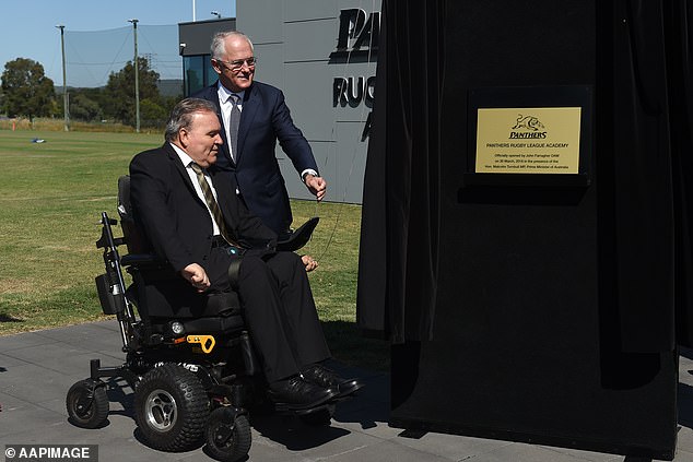 Farragher (left) was awarded the Medal of the Order of Australia for his inspirational work in rugby league in 2016