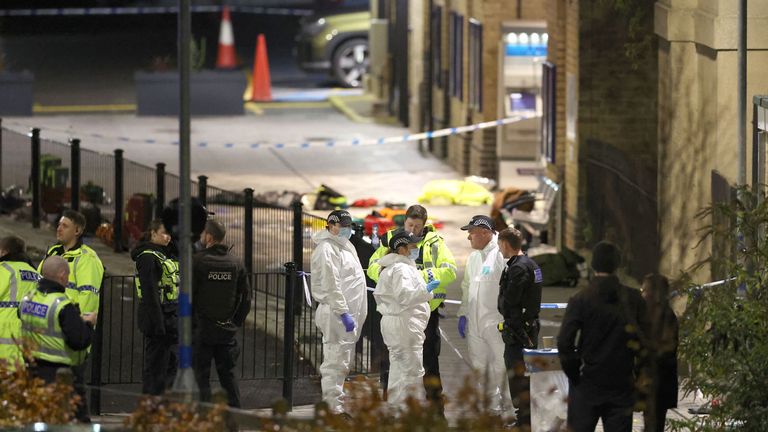 Police erected a cordon outside the station. Pic: PA