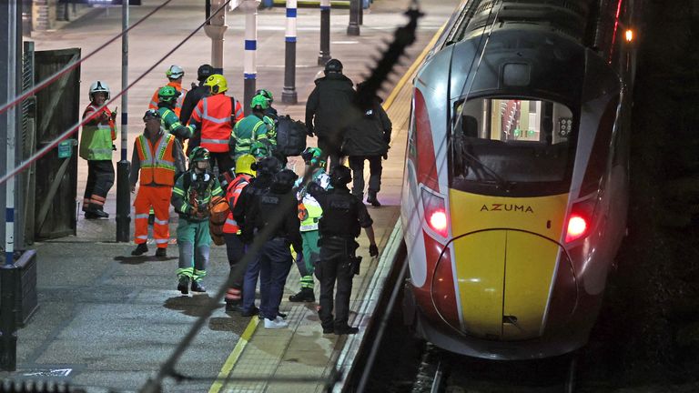 Emergency responders at Huntingdon station in Cambridgeshire on Saturday night. Pic: PA