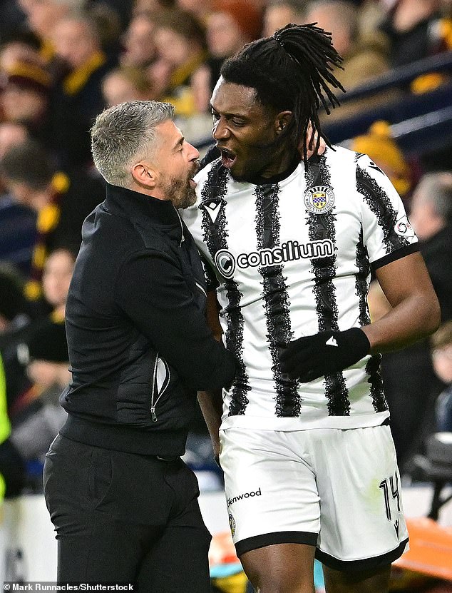St Mirren manager Stephen Robinson celebrates with goalscorer Dan Nlundulu