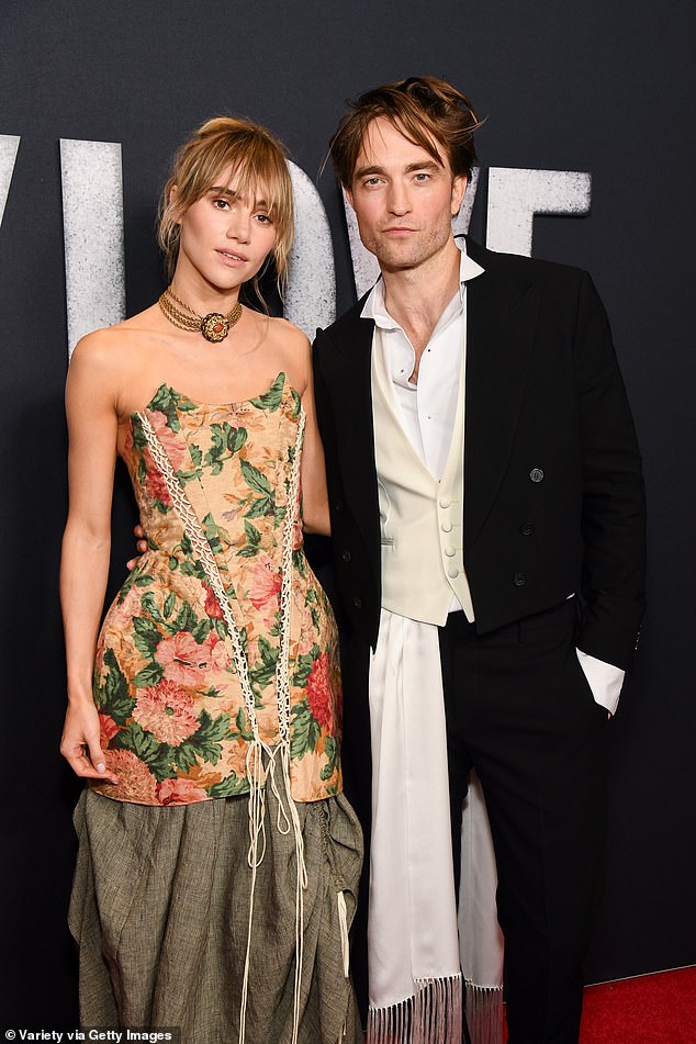 She accessorized with a chunky necklace and wore her blonde tresses pinned up