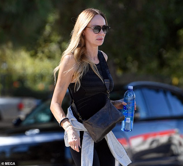 Then the blonde appeared in films including Kingpin with Woody Harrelson and The Perfect Score with Scarlett Johansson