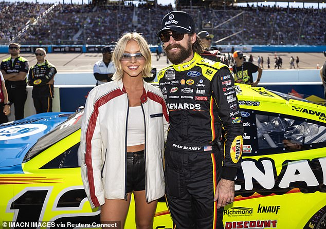 Hollywood star Sweeney poses with NASCAR driver Ryan Blaney before the big race