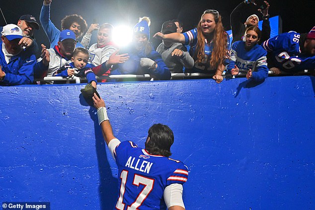 Allen salutes the Bills fans as he makes his way off the field after a huge win for his team